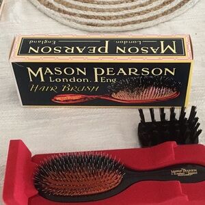 Mason Pearson, handy size, bristle and nylon brush. Dark ruby color.